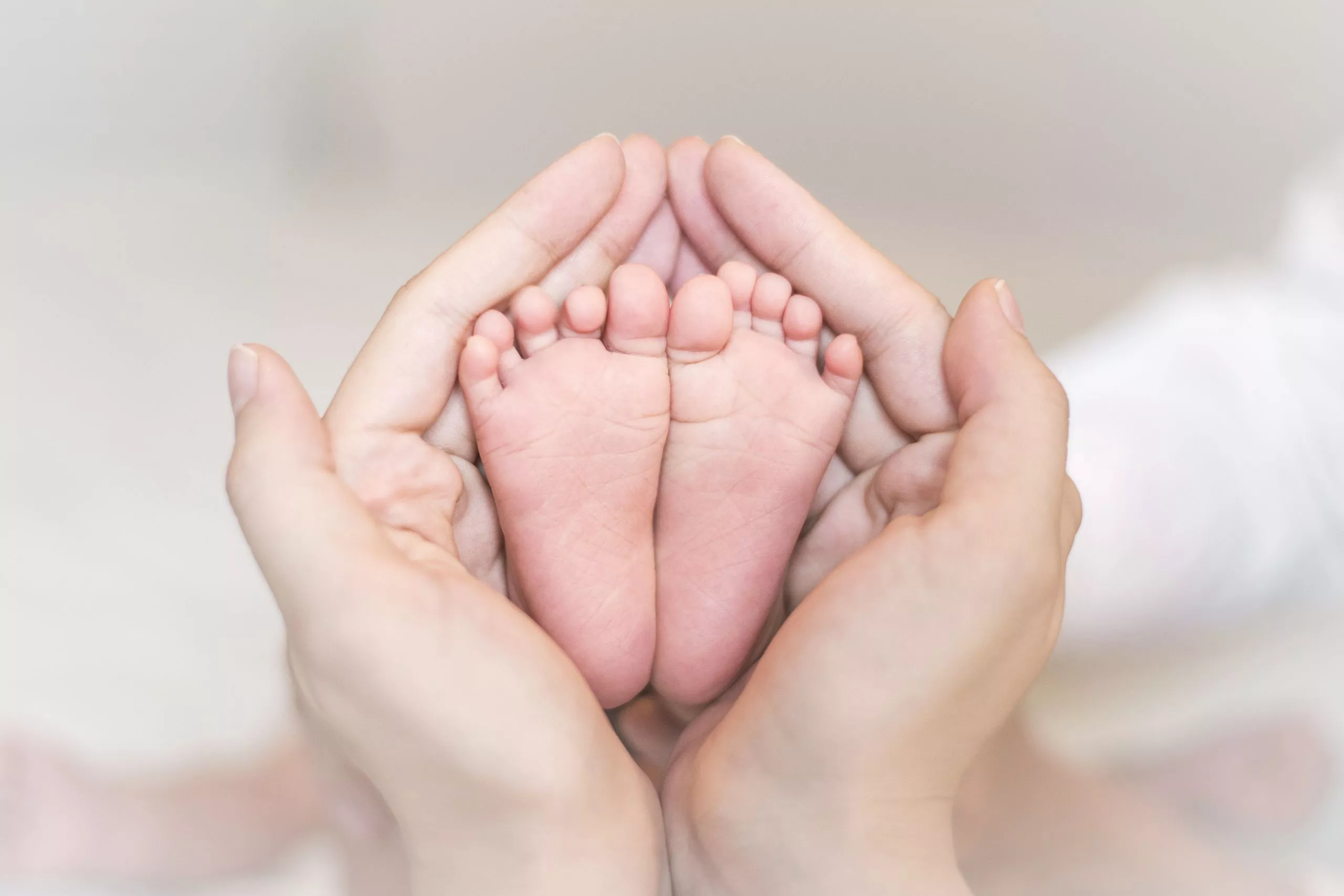Adult Holding Infant Feet, Newborn Photography Ideas