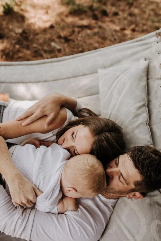 Family Photoshoot On The Bed